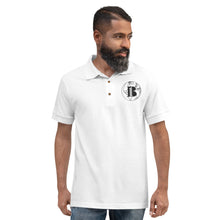 Load image into Gallery viewer, &quot;A-B1 World&quot; White, Trademark Embroidered Polo Shirt
